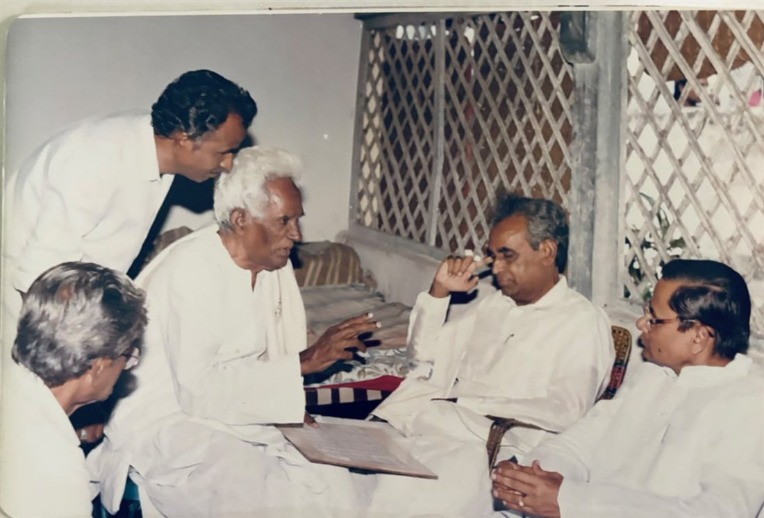 Konada Surya Prakasa Rao in conversation with community elders and leaders